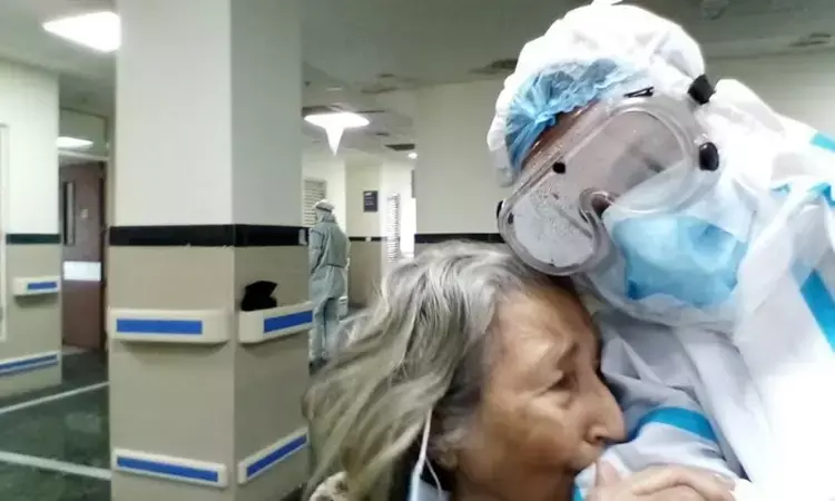 Elderly patient hugs PPE clad doctor after recovering from COVID, picture goes viral