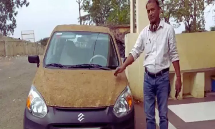 Homeopathic doctor coats his car with cow dung to beat the heat in Madhya Pradesh