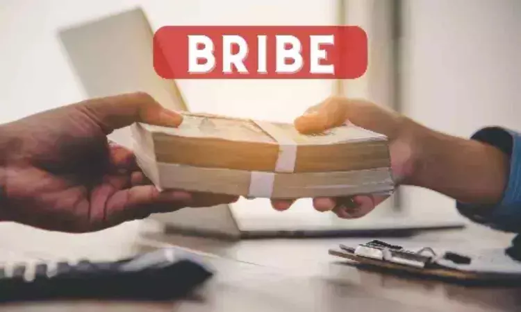 asst drug controller takes bribe