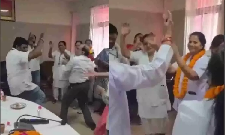 Doctors and nurses dancing