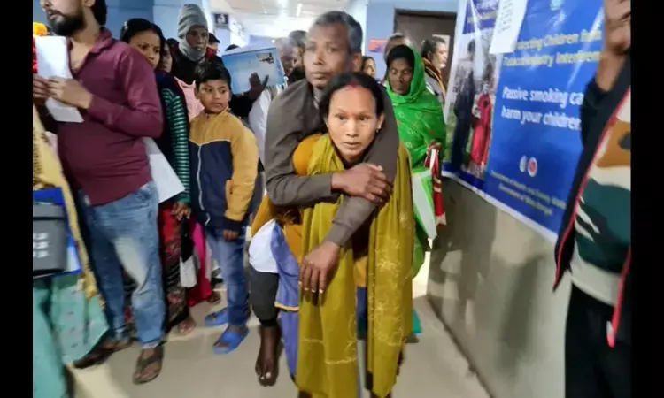 Wheelchair unavailable, woman forced to carry injured husband on her back at Raiganj Hospital