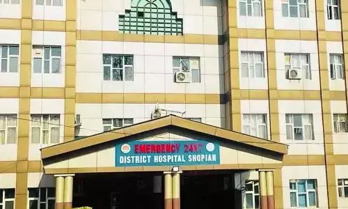 Gynaecologist rides excavator to reach Shopian hospital amid waist-deep snow