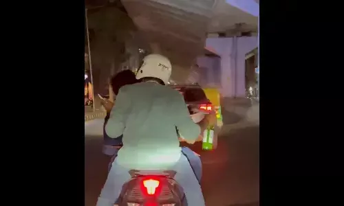 Bengaluru Doctors Arrested for Consuming Alcohol on Two-Wheeler in Public