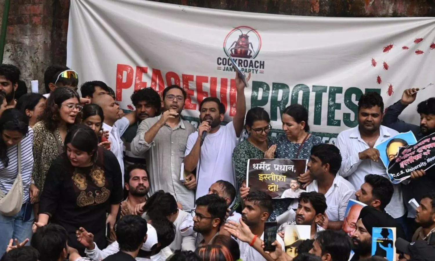 We want Dharmendra to resign: Cockroach Janta Party holds protest at Jantar Mantar over NEET 2026 controversy We want Dharmendra to resign: Cockroach Janta Party holds protest at Jantar Mantar over NEET 2026 controversy