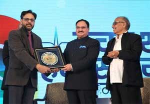 Health Minister Awards Dr Sumit Sinha for special contribution to medicine