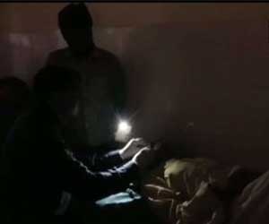 Patient administered stitches under cell phone flashlight in govt hospital